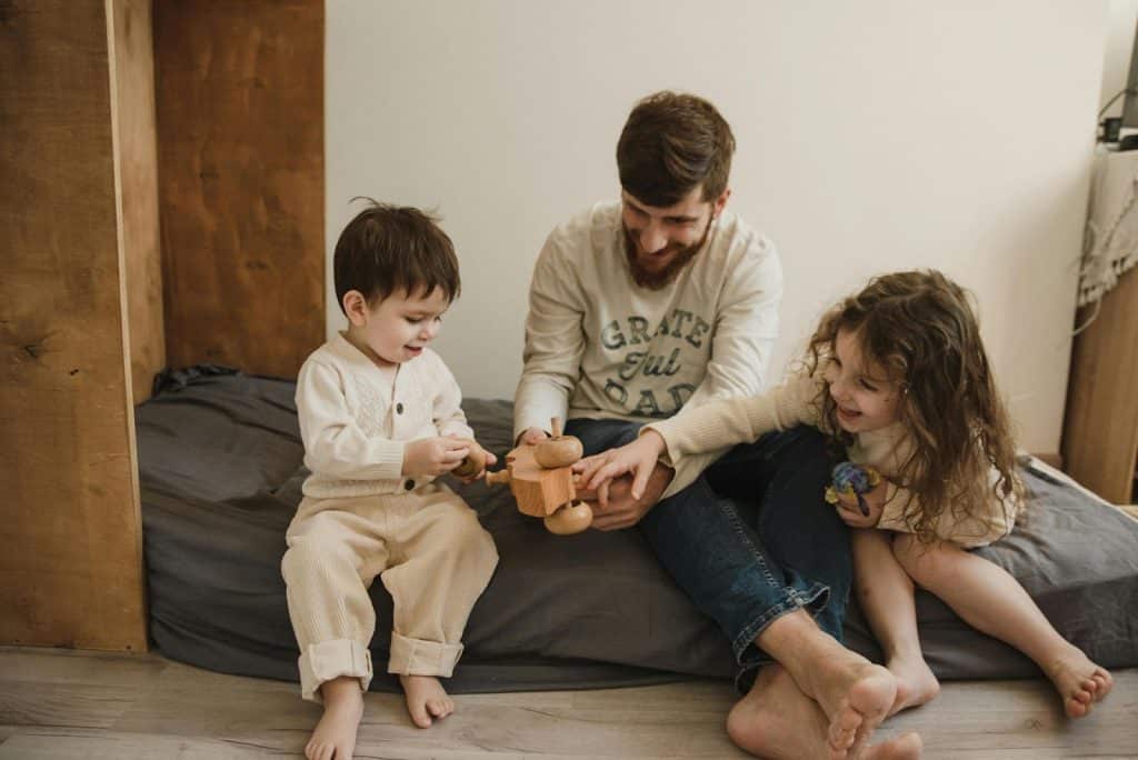A man taking care of their children