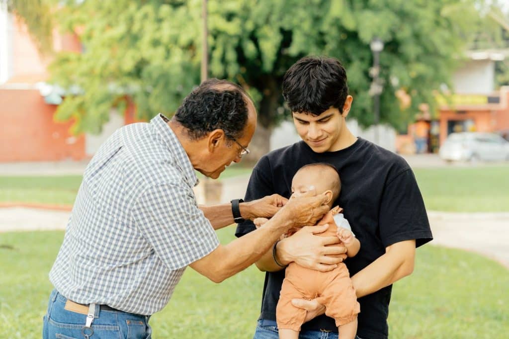A man teaching his son