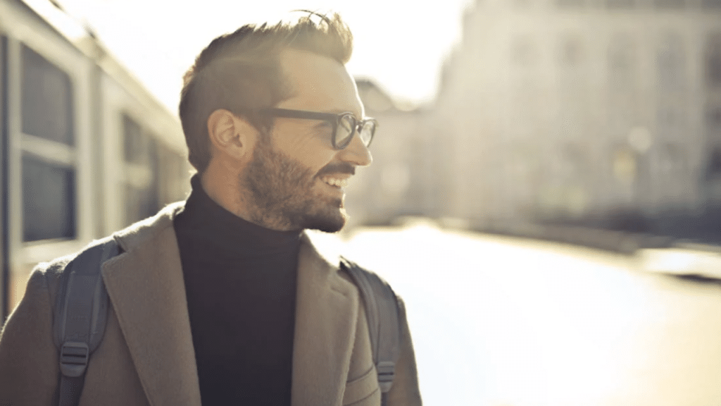 A man smiling outdoors