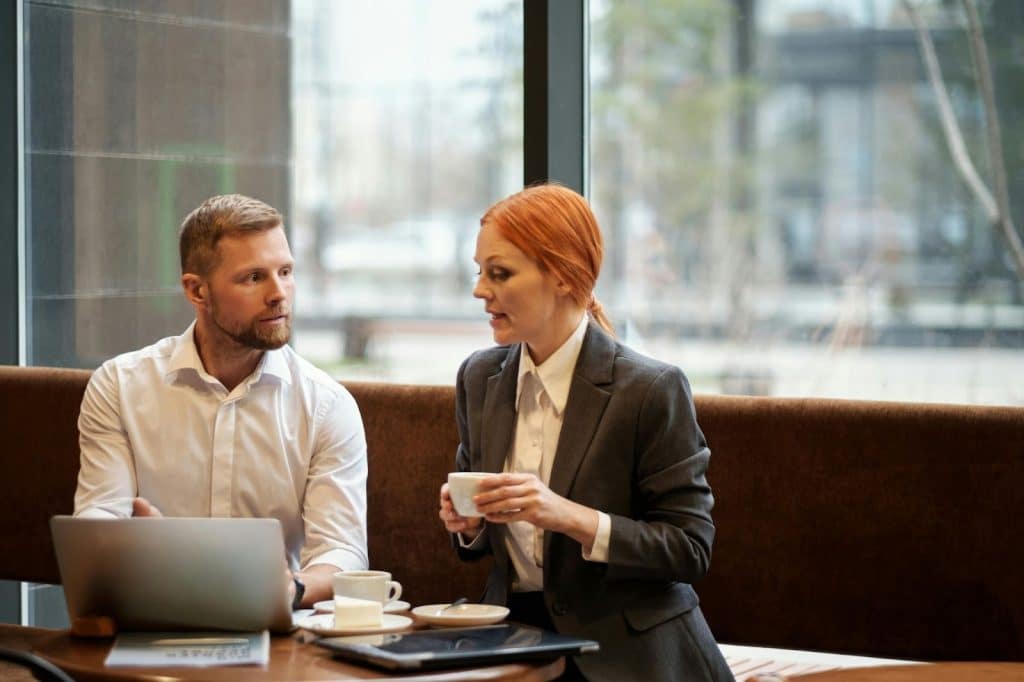 A man and woman talking