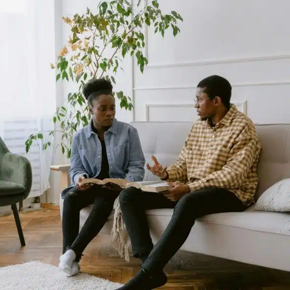A man talking to woman