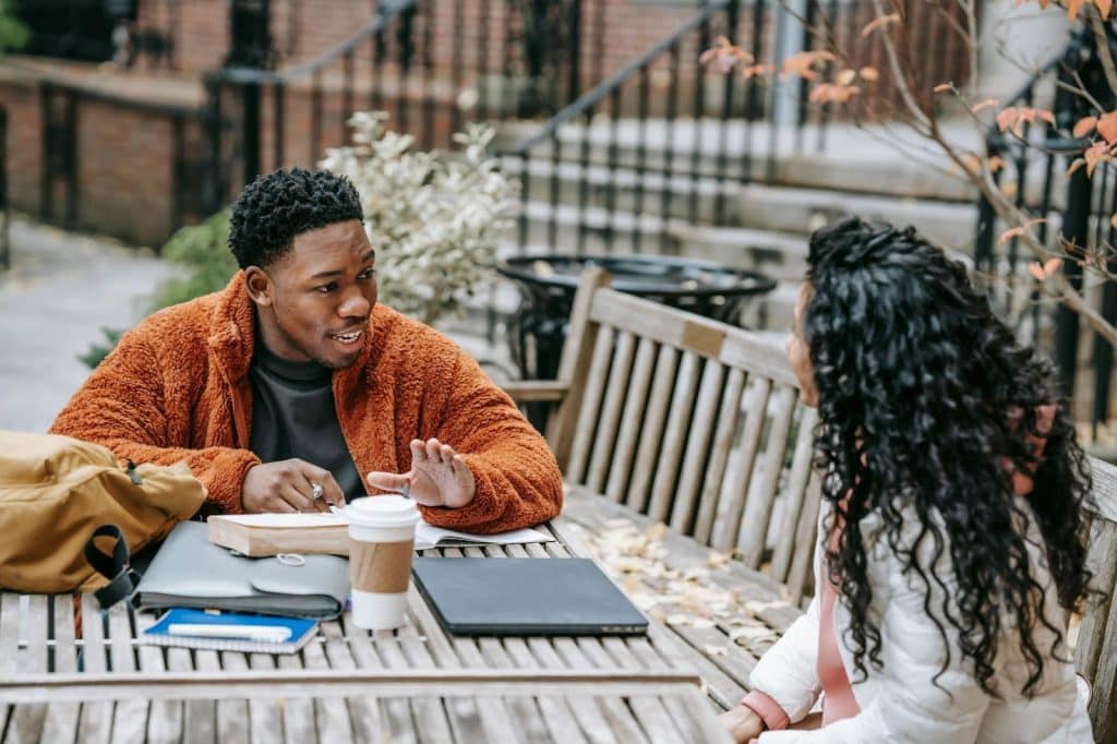 A man looking at the woman