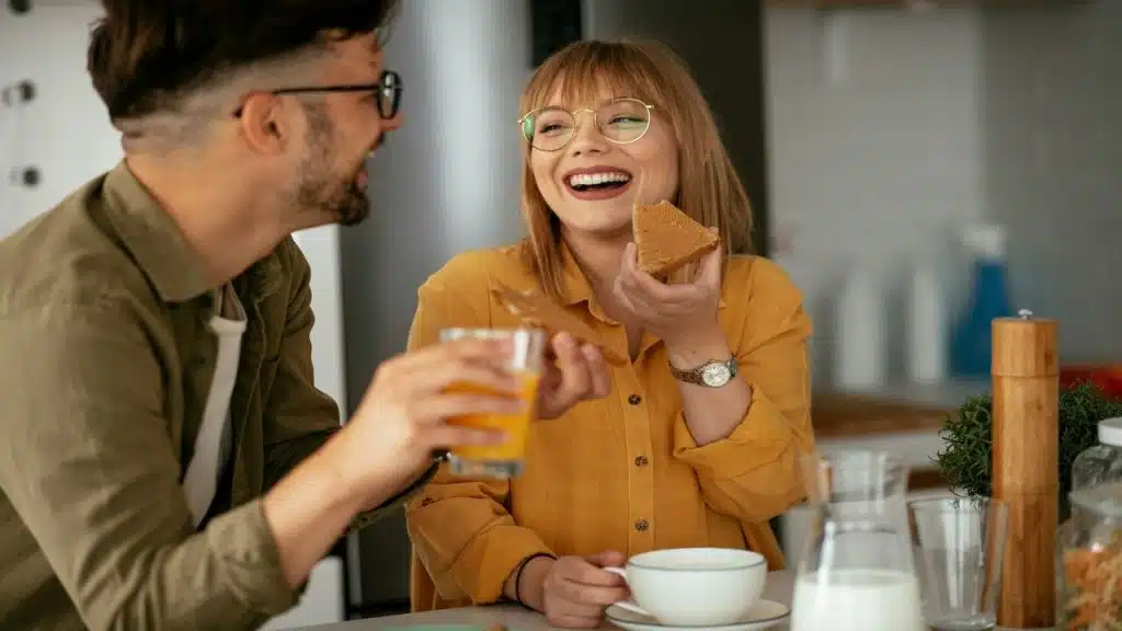 A couple having breakfast at home