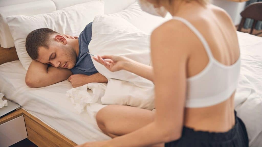 A woman taking care of her sick husband 