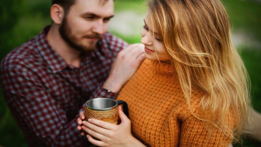 A couple having coffee together