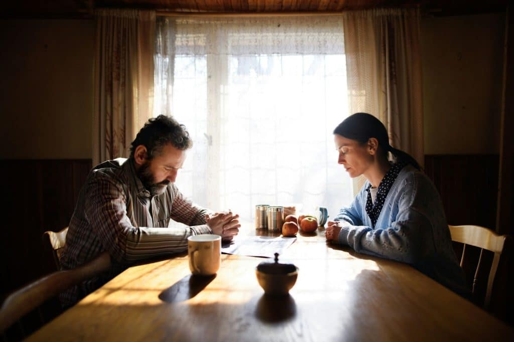 A man and woman being silent