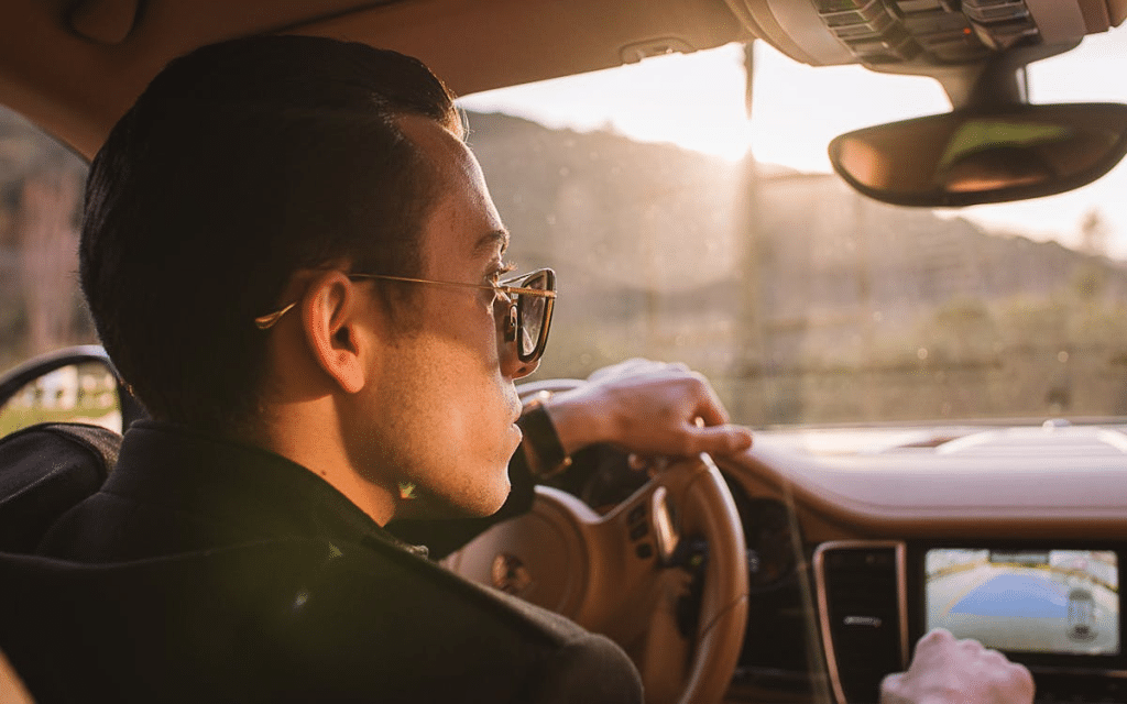 A man driving a car