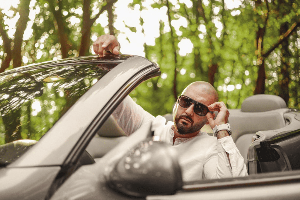 A man driving a car