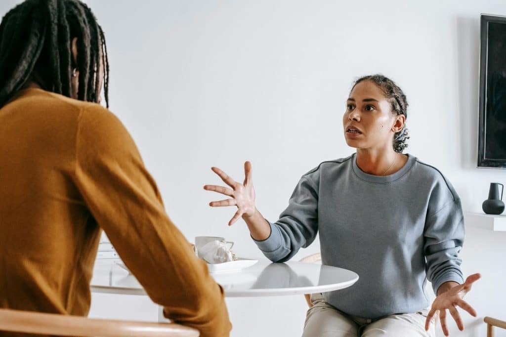A woman asking a man
