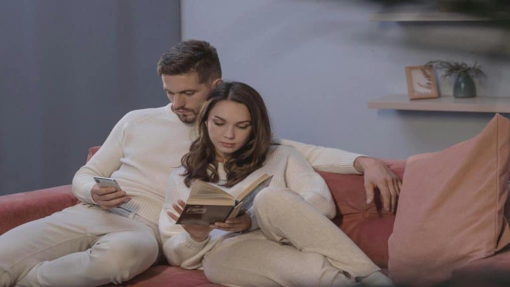 A couple relaxing at home