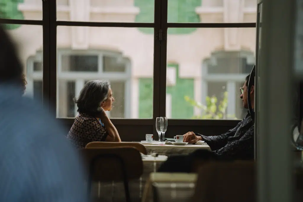 A man and a woman sitting at the table