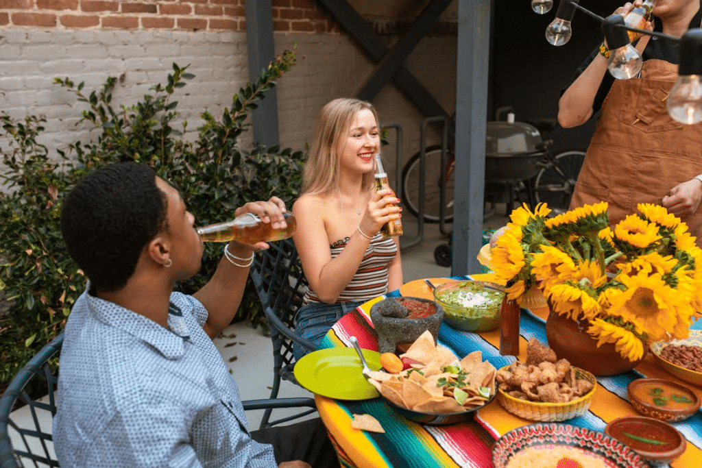 A man and a woman drinking beer