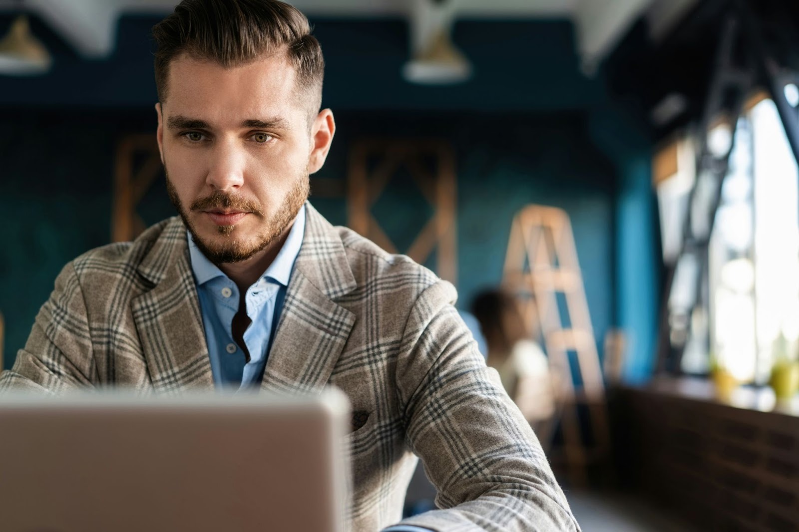 A man watching from a tablet 