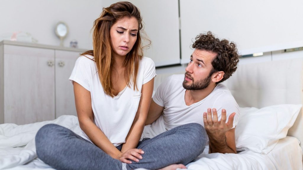 A man talking to woman