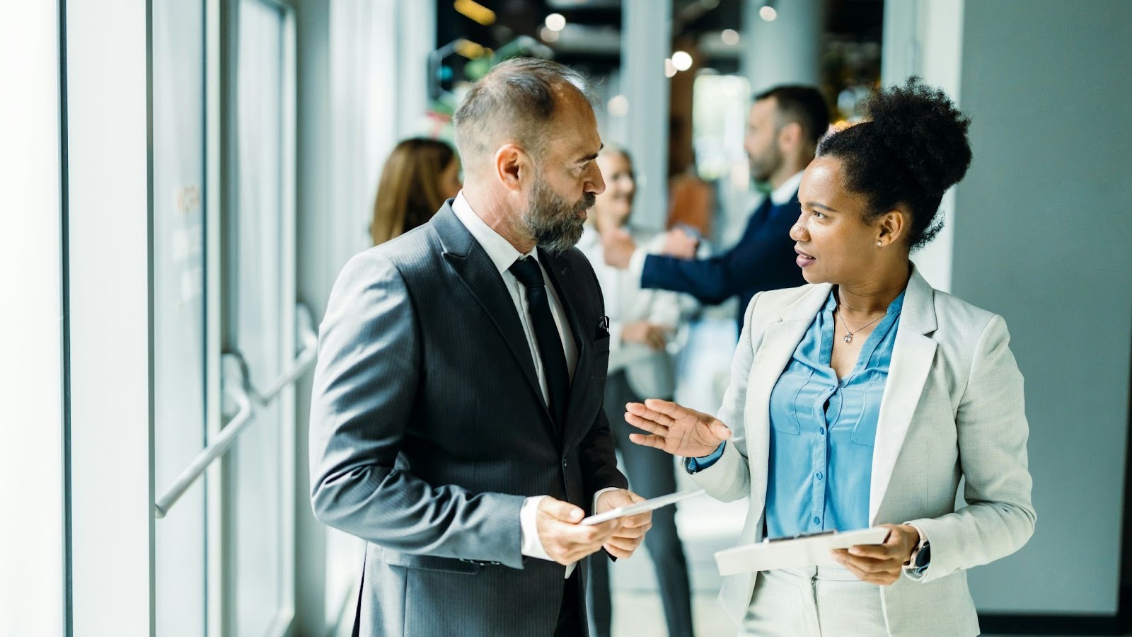 A man talking to woman