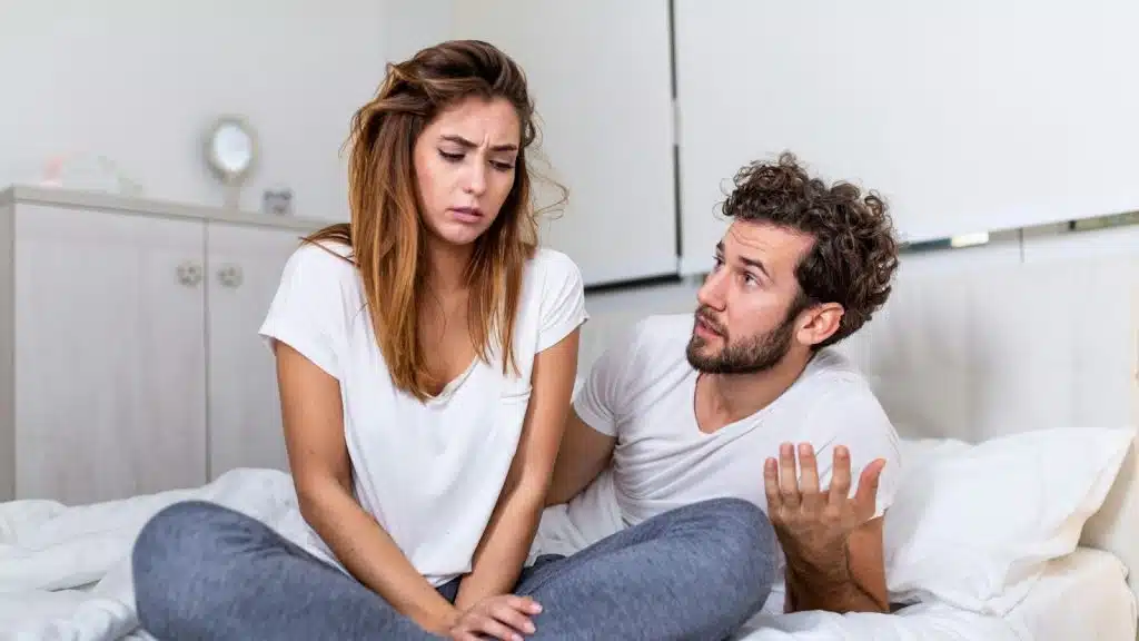 A man talking to woman