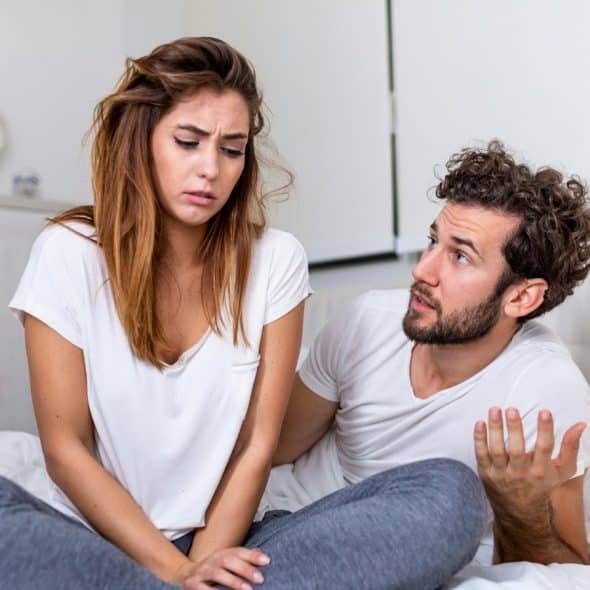 A man talking to woman