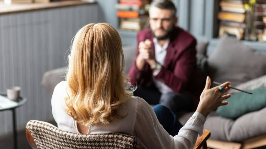 A man and woman talking