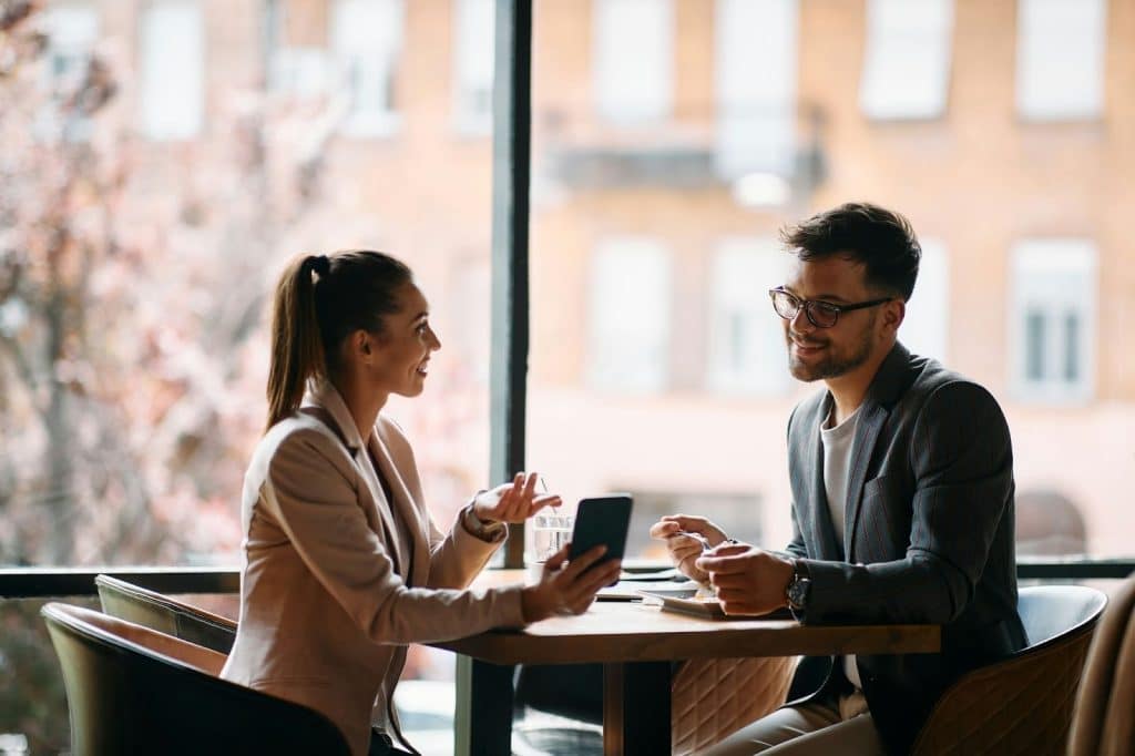 A man and woman talking