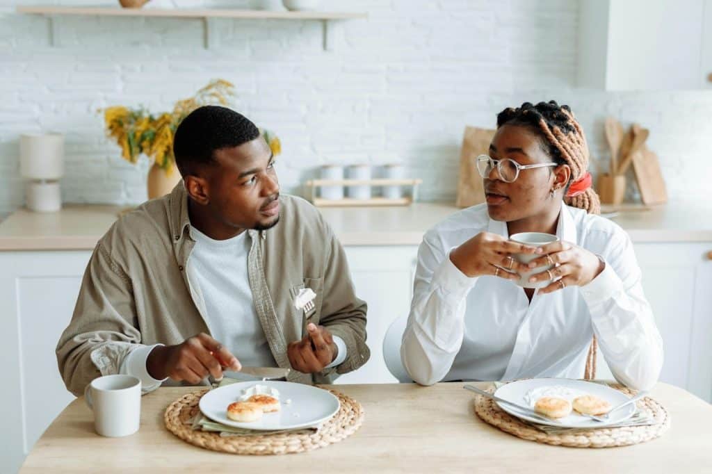 A man asking something to woman