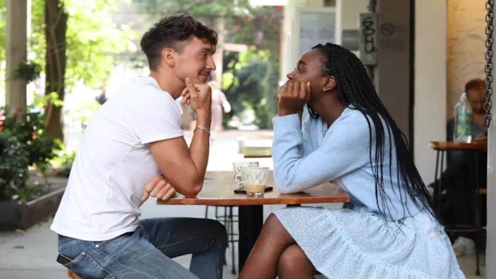 A couple looking at each other during their date
