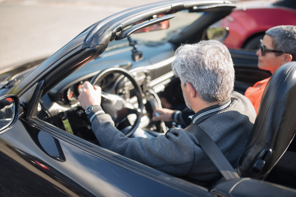 A man driving a car