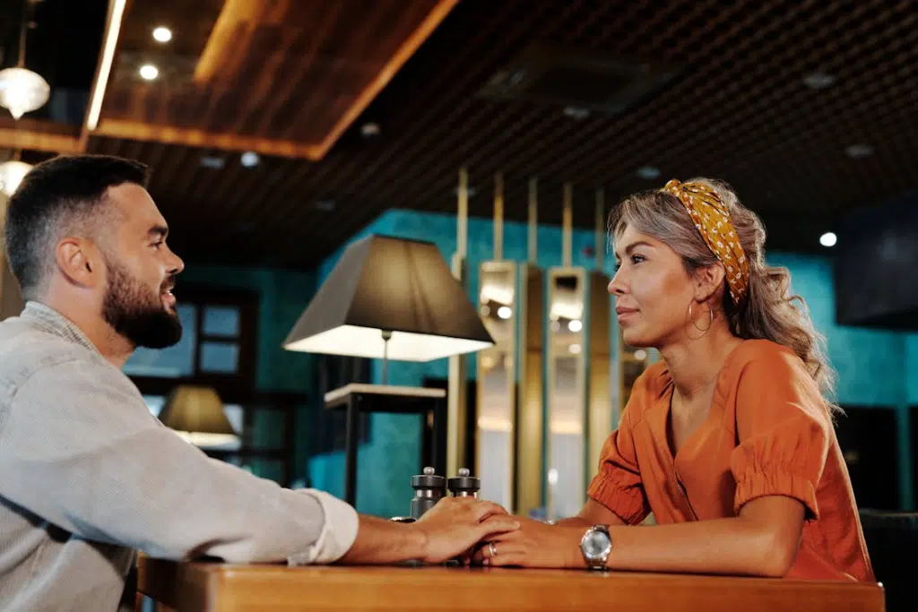 A couple talking in a restaurant