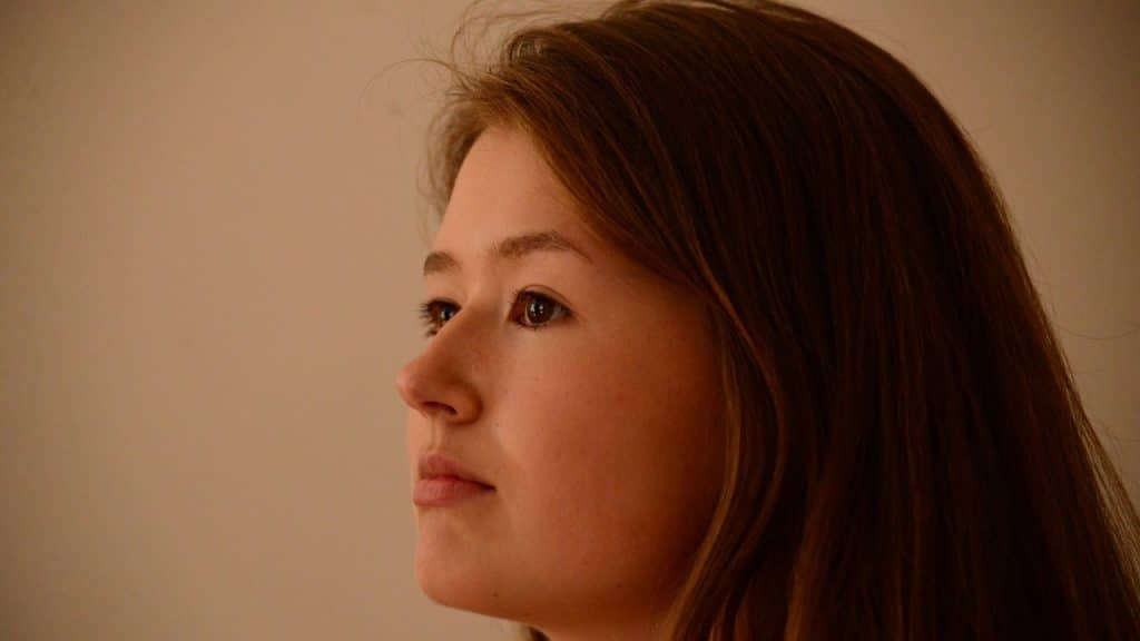 A woman looking serious.