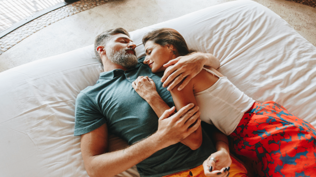 A mature couple relaxing in a hotel room