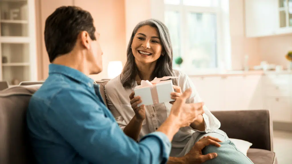 A wife receiving a gift from her husband