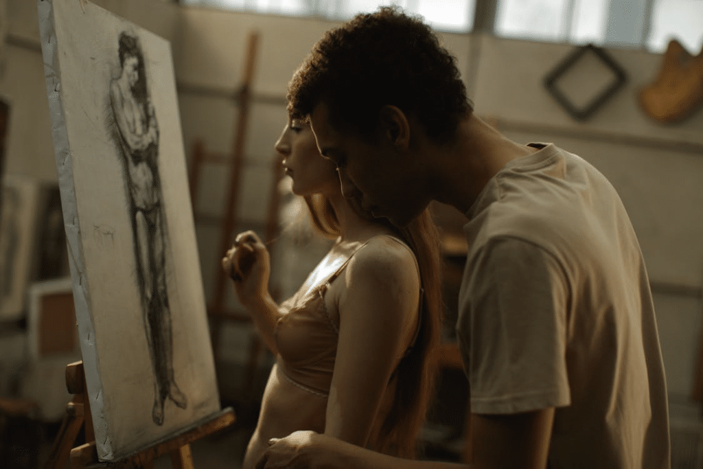 A man and a woman sketching