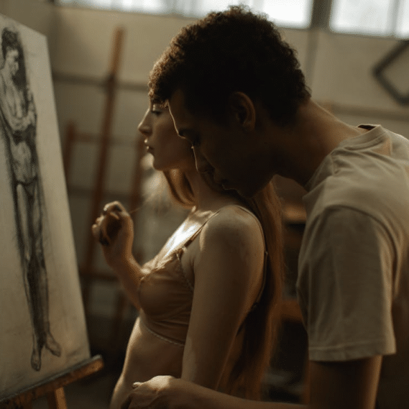 A man and a woman sketching