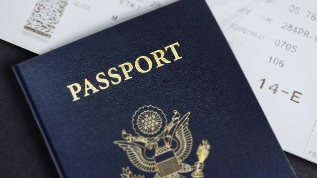 A passport with a boarding pass.
