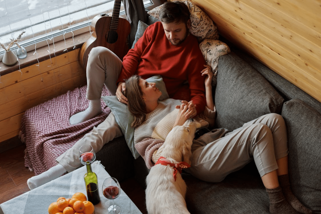 Couple relaxing on a gray sofa