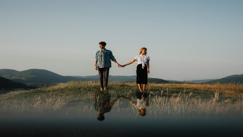 A couple standing on a field