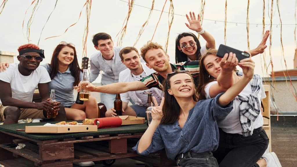 Young adults having beer together