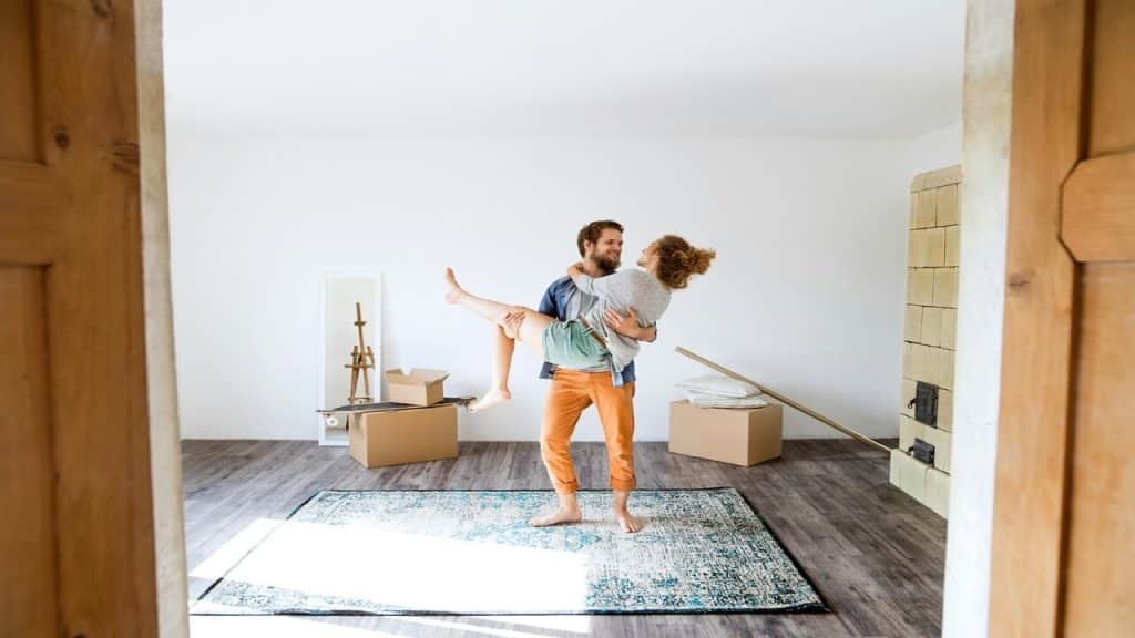 A couple excited at home