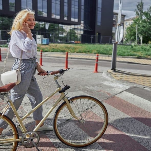 A beautiful woman with a bike