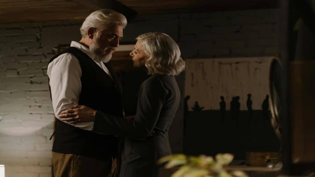 A couple looking at each other at home