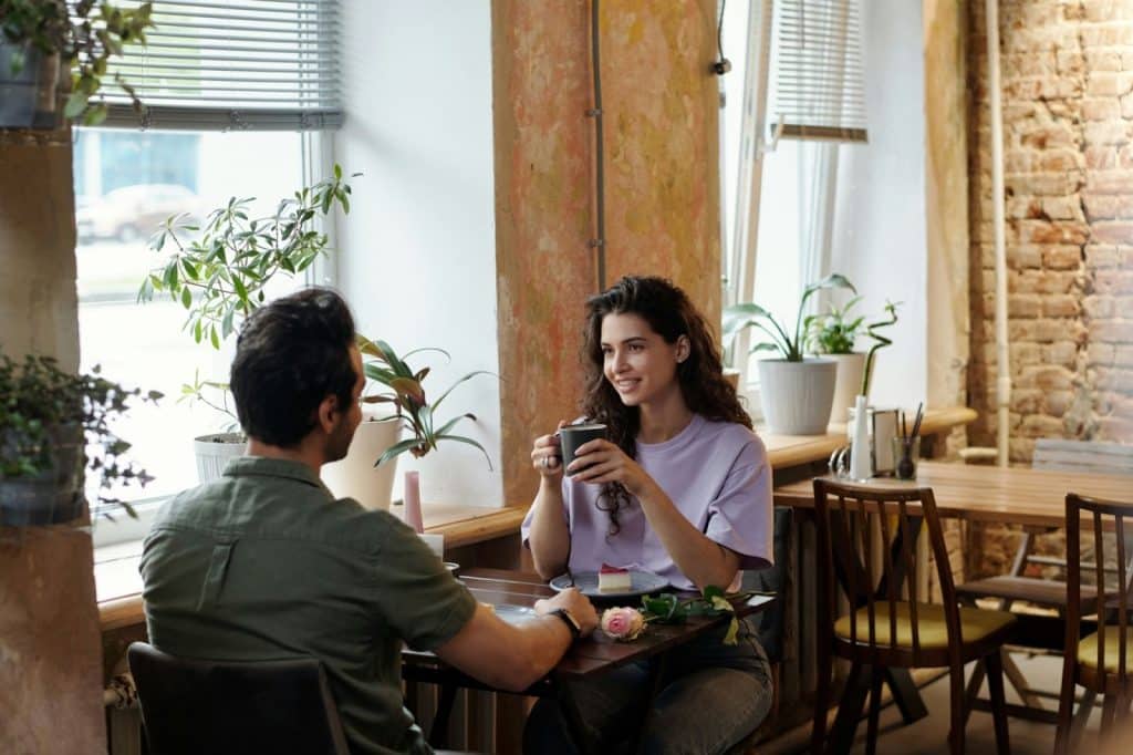 A man and woman talking