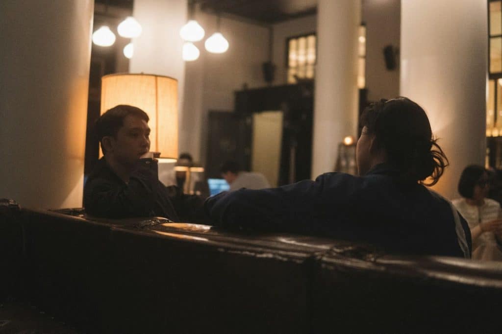 A man and woman looking at each other