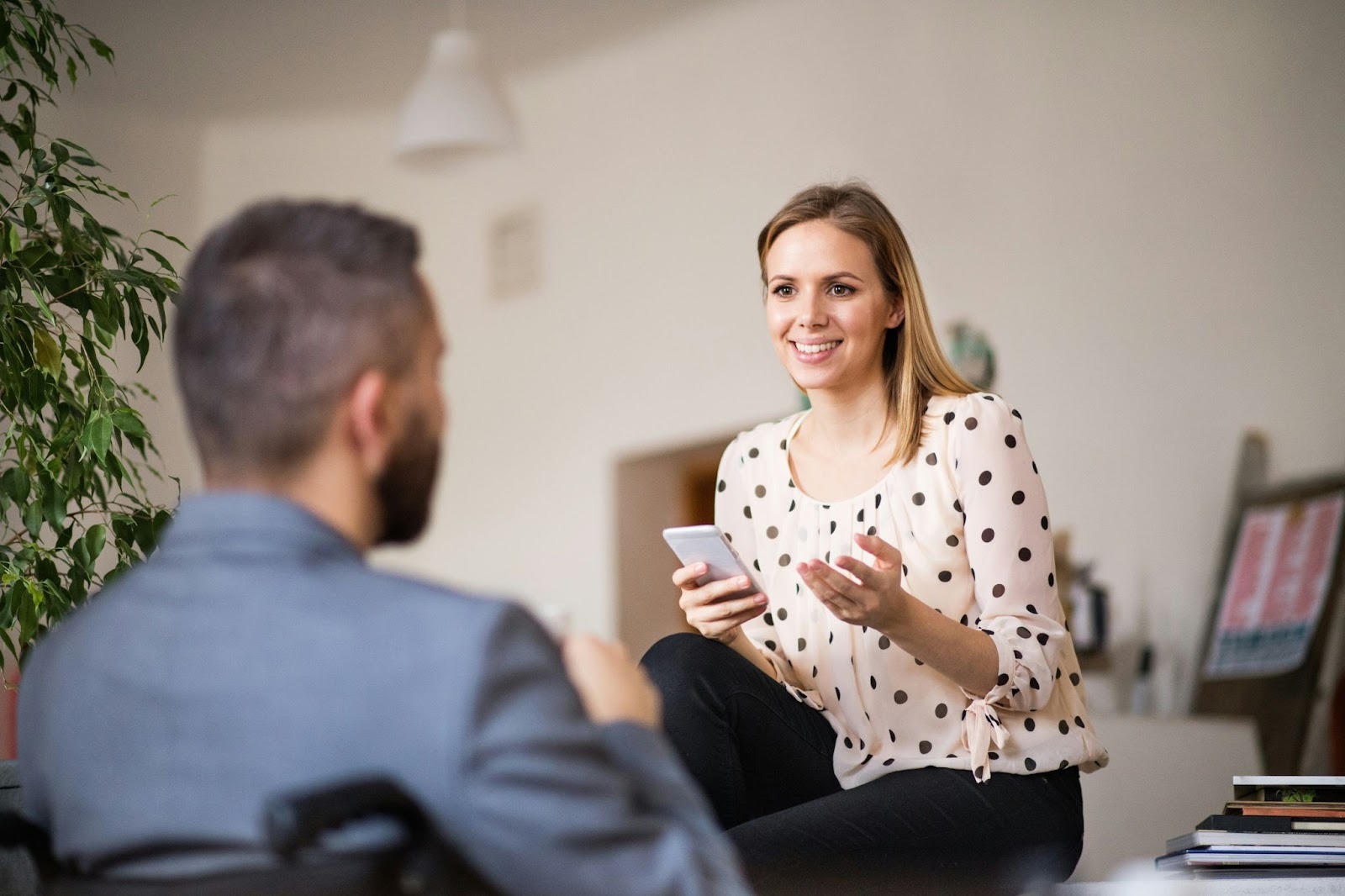 A man and woman talking