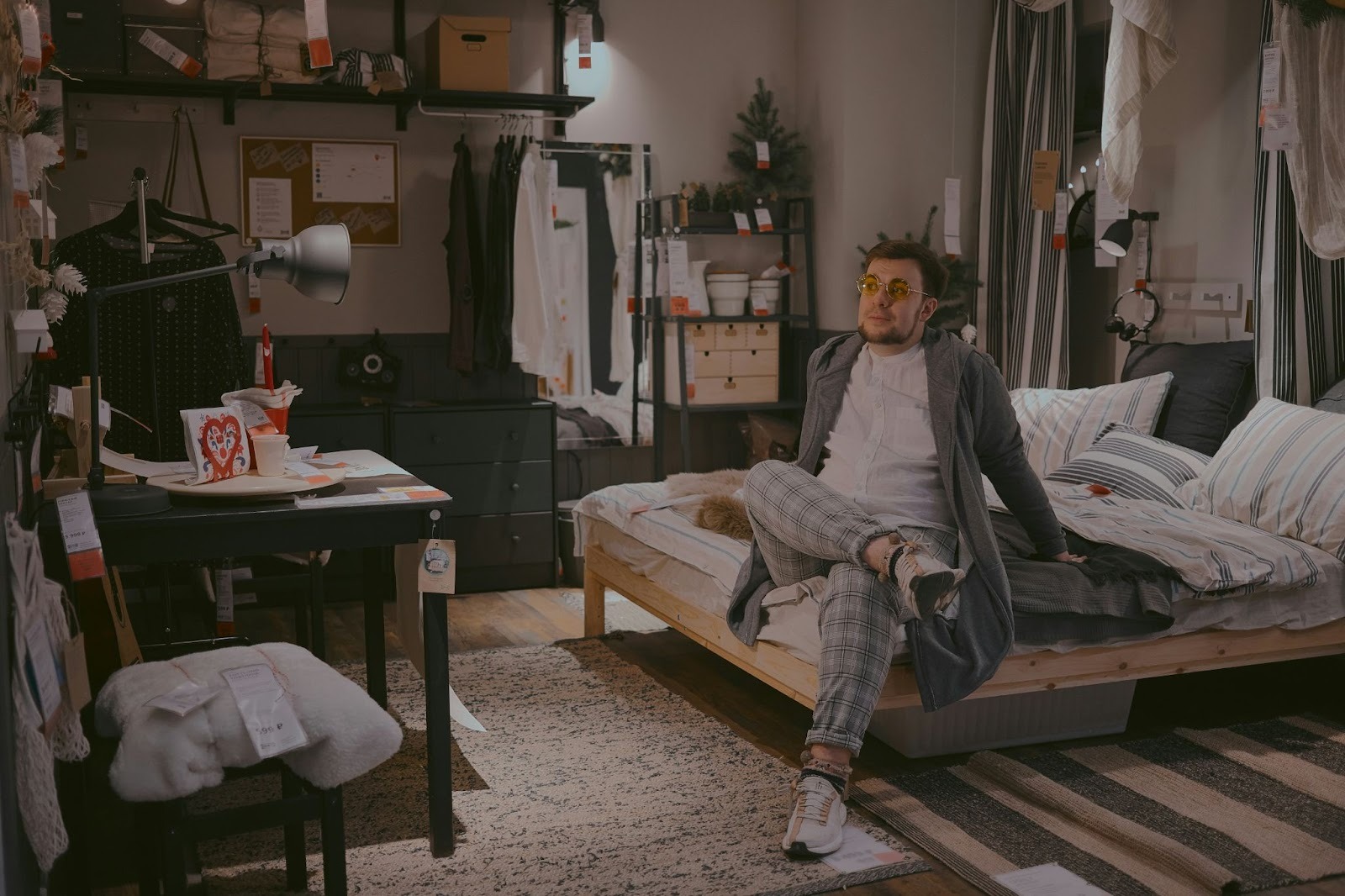 A man sitting on the bed