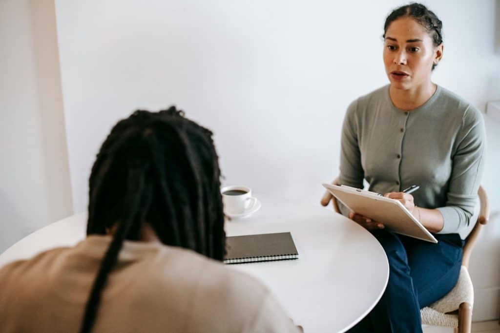 A man and woman talking