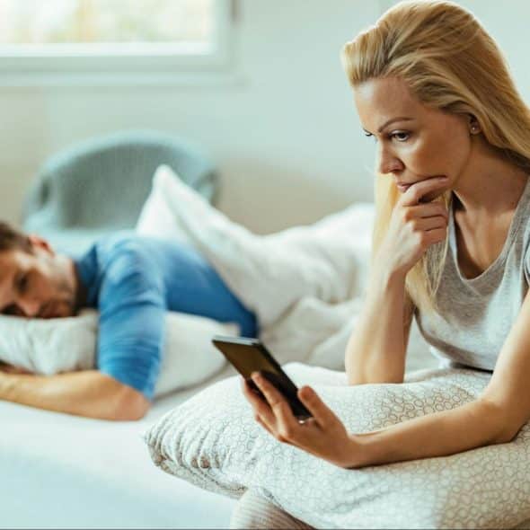 A man observing a woman