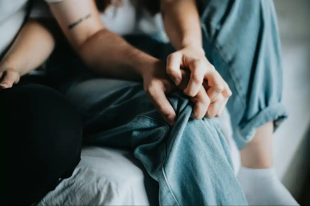 A man and woman holding hands