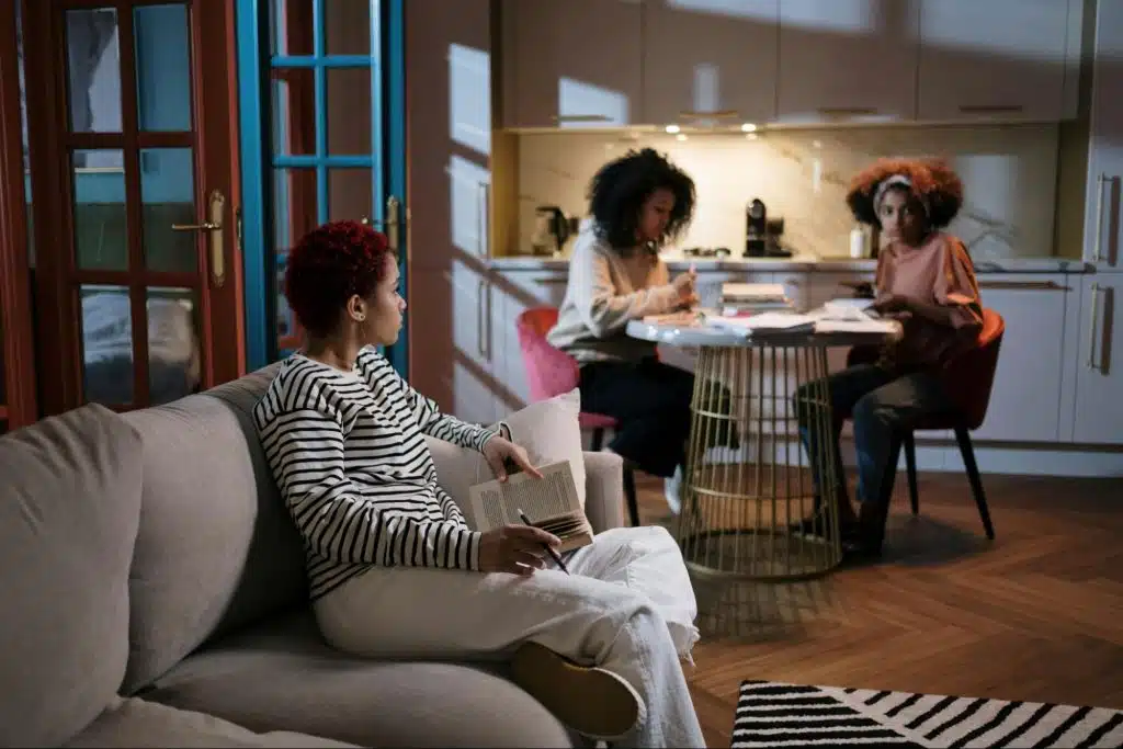 A woman looking at their children
