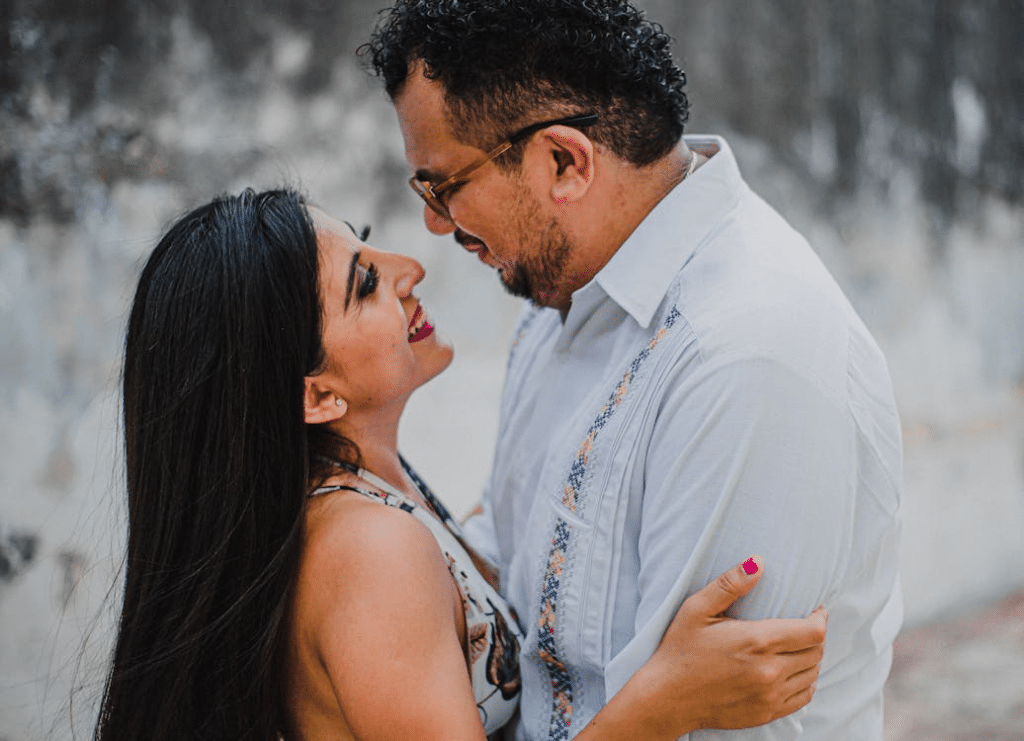 A couple facing each other