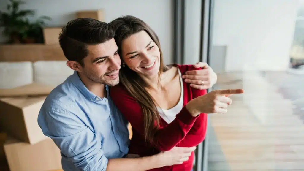 A couple moving into a new home