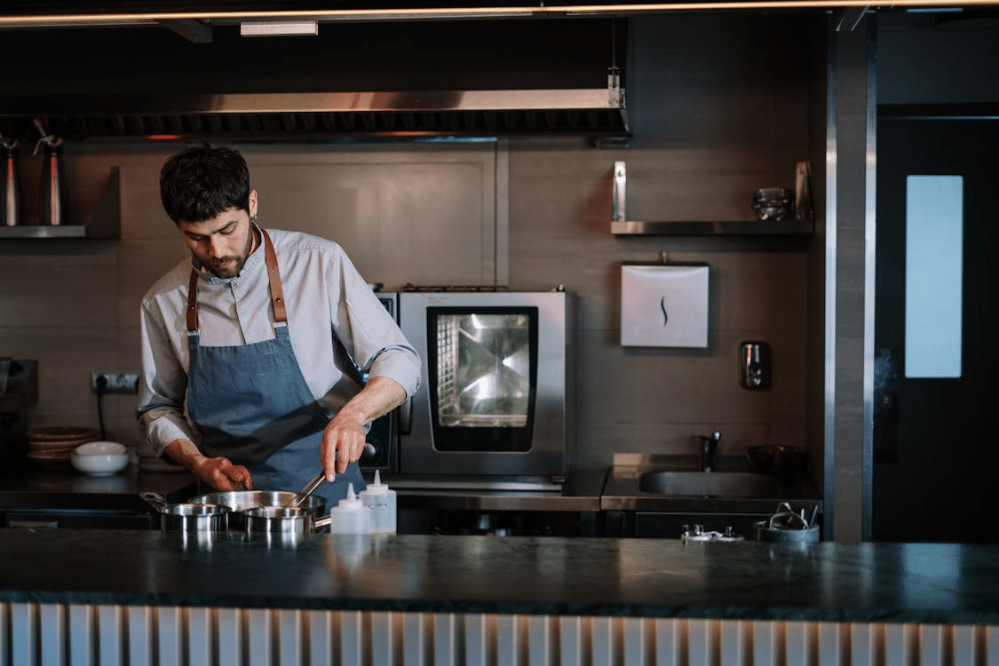 A man cooking in the kitchen